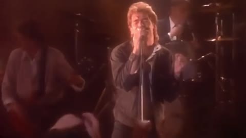 Huey_Lewis_The_News_The_Power_Of_Love_Official_Video-_im