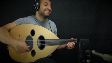 Despacito_-_Luis_Fonsi__Daddy_Yankee_ft__Justin_Bieber_Oud_cover_by_Ahmed_Alshaiba480P