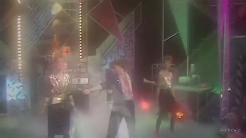 Trans_X_-_Living_On_Video_TOTP_1985-world79_spcs_bio_1